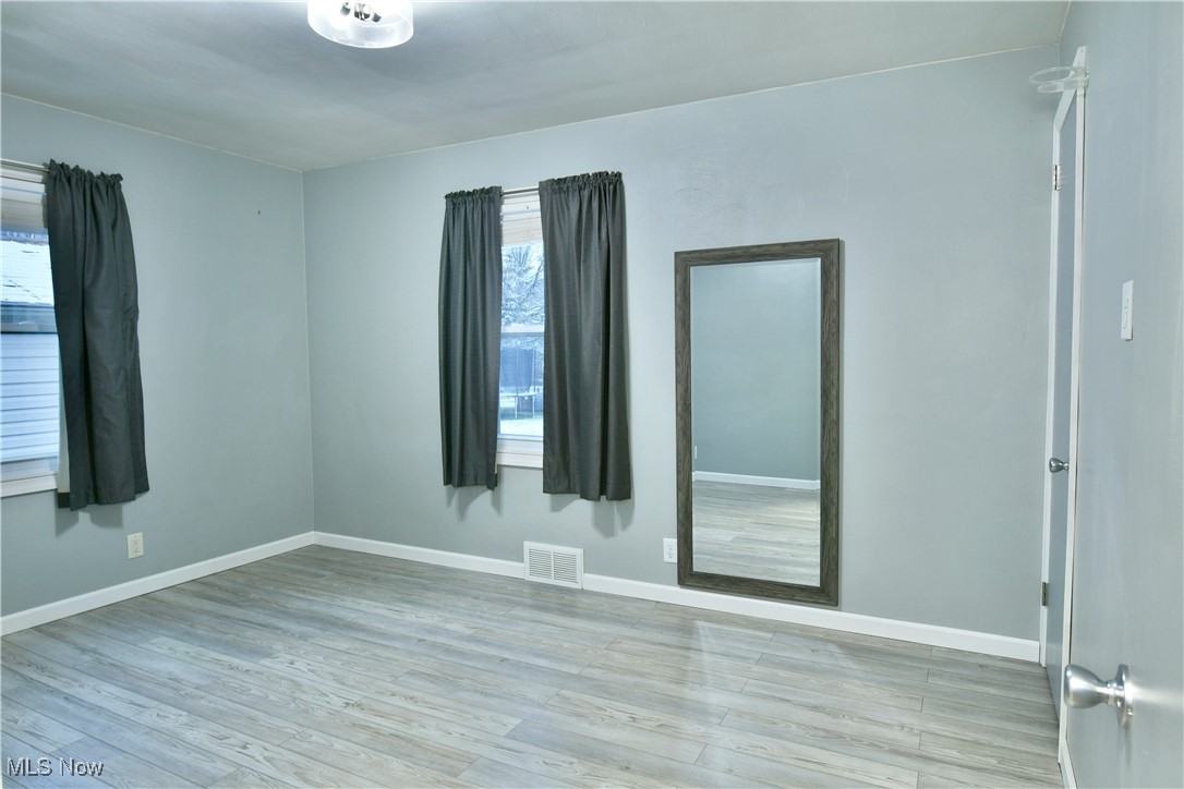 4335 Crew Hood Road Girard, OH 44420 - Photo 23 of 50 Spare room featuring light wood-type flooring