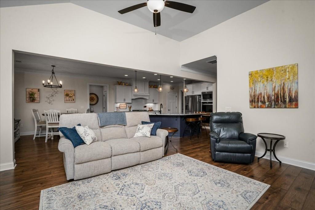 641 Haven Way Monroe, GA 30655 - Photo 16 of 55 a living room with furniture and a wooden floor