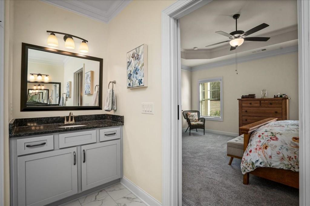 641 Haven Way Monroe, GA 30655 - Photo 27 of 55 a en suite spacious bathroom with a double vanity sink and a mirror