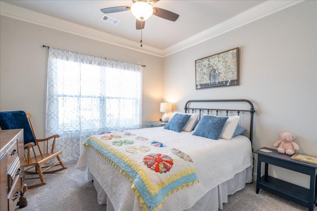 641 Haven Way Monroe, GA 30655 - Photo 30 of 55 a bedroom with a bed and a large window