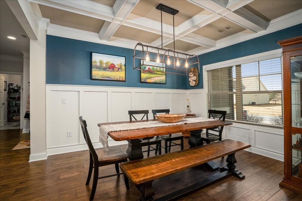 641 Haven Way Monroe, GA 30655 - Photo 3 of 55 a view of a dining room with furniture wooden floor and chandelier