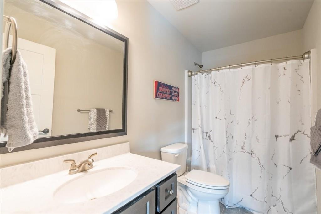 641 Haven Way Monroe, GA 30655 - Photo 33 of 55 a bathroom with a sink toilet and shower