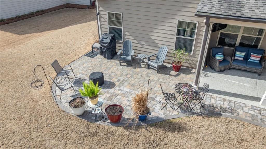 641 Haven Way Monroe, GA 30655 - Photo 40 of 55 a vase of flowers sitting on a table