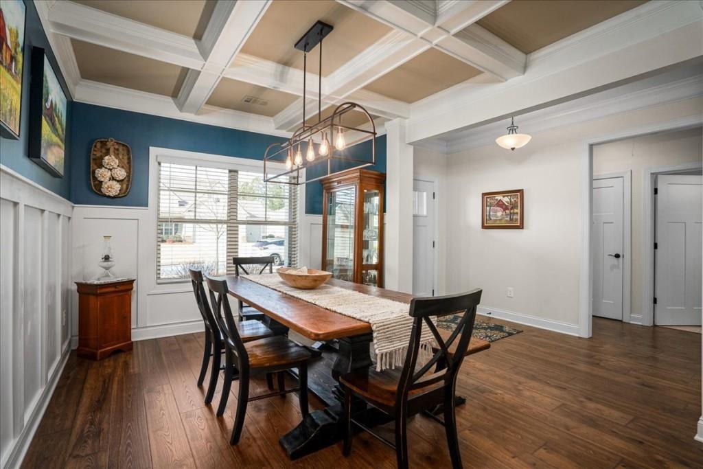 641 Haven Way Monroe, GA 30655 - Photo 4 of 55 a view of a dining room with furniture window and wooden floor