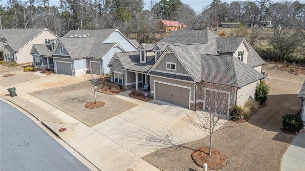 641 Haven Way Monroe, GA 30655 - Photo 49 of 55 an aerial view of a house with table and chairs