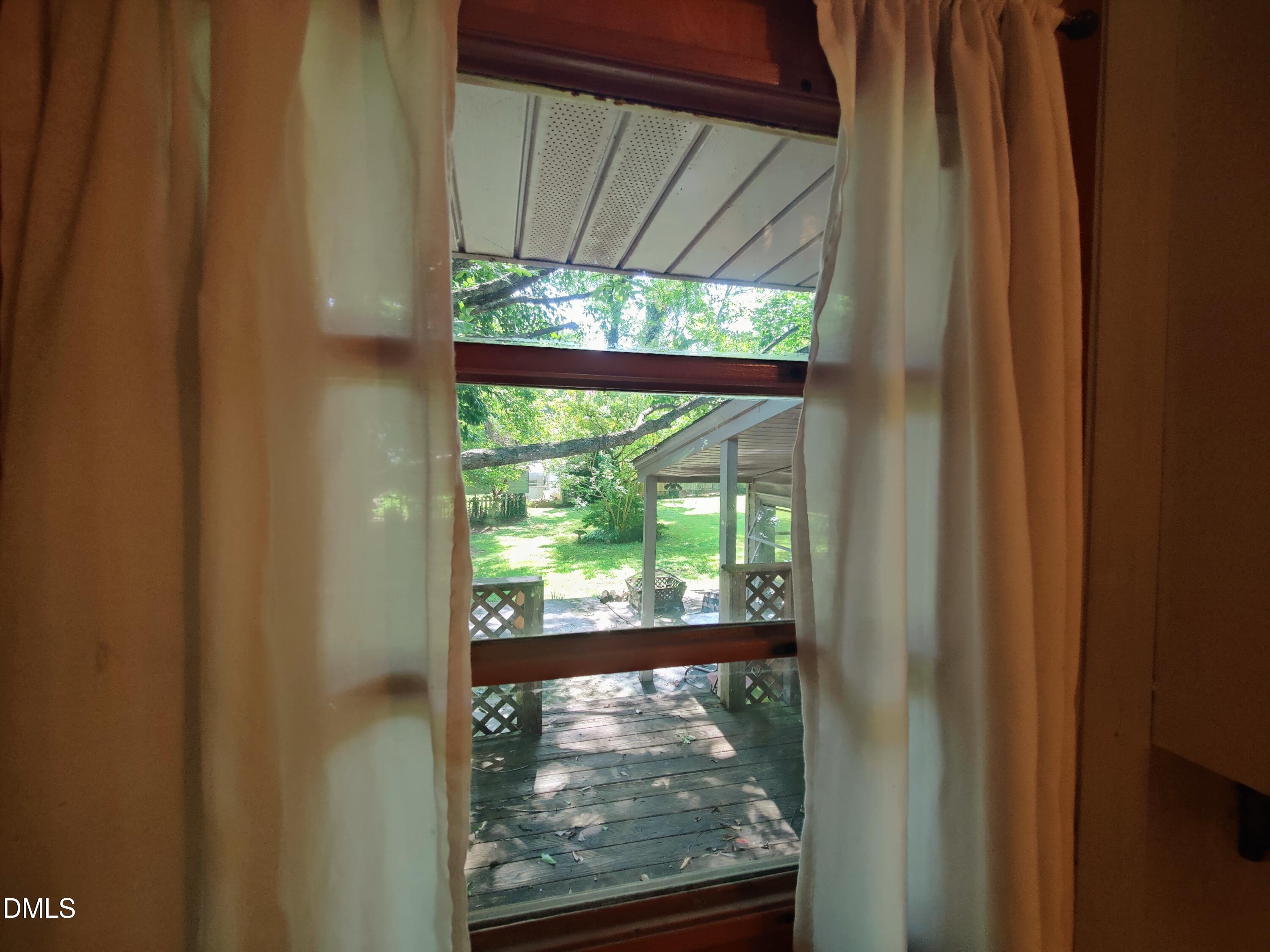 406 Avery Street Garner, NC 27529 - Photo 41 of 55 Rear Deck From Kitchen