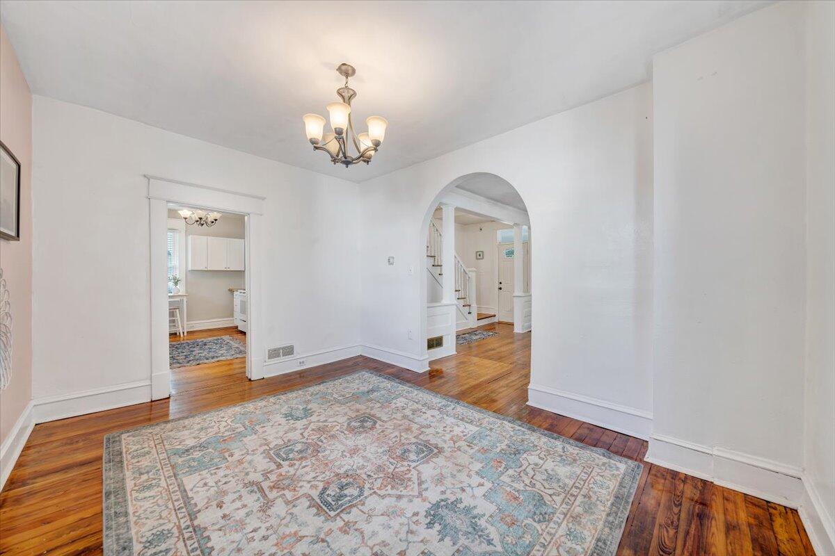 1008 5th Street Southeast Roanoke, VA 24013 - Photo 12 of 60 wooden floor in an empty room with a window