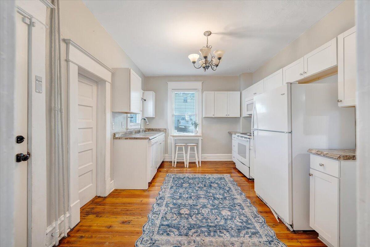 1008 5th Street Southeast Roanoke, VA 24013 - Photo 15 of 60 a kitchen with stainless steel appliances granite countertop a refrigerator oven a sink and dishwasher