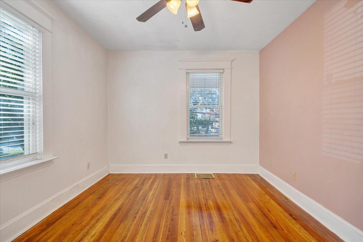 1008 5th Street Southeast Roanoke, VA 24013 - Photo 23 of 60 wooden floor in an empty room with a window