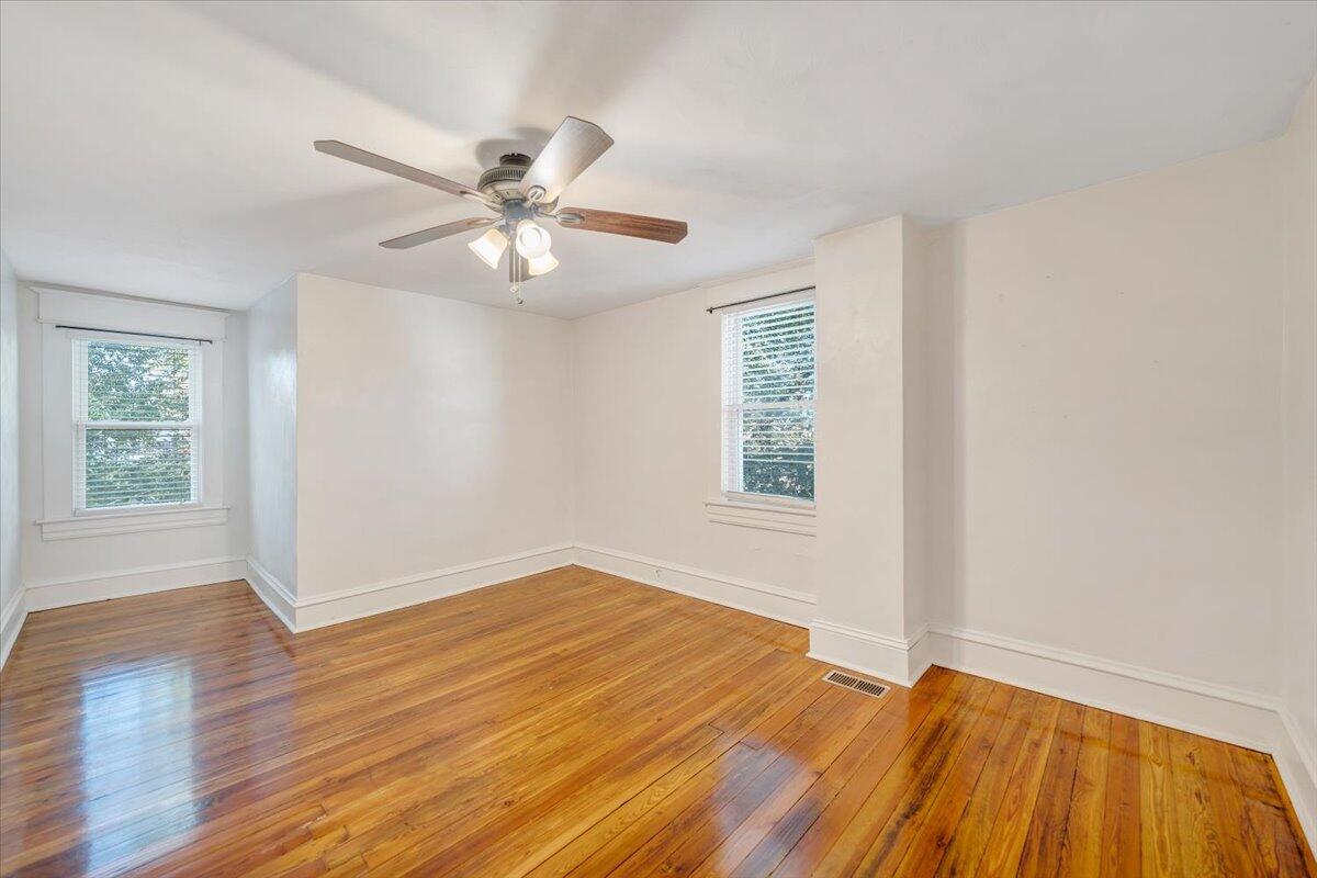 1008 5th Street Southeast Roanoke, VA 24013 - Photo 26 of 60 wooden floor in an empty room with a window