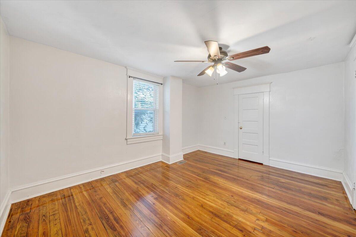 1008 5th Street Southeast Roanoke, VA 24013 - Photo 27 of 60 wooden floor in an empty room with a window