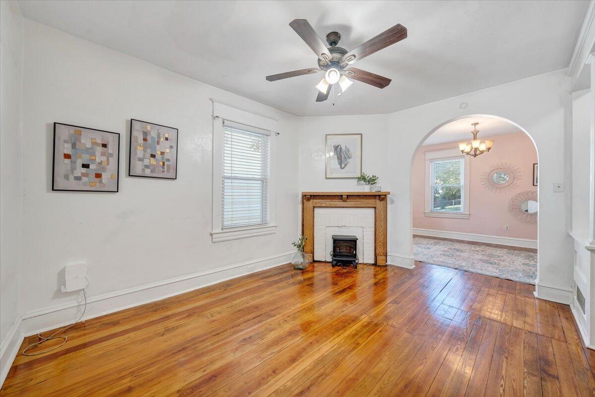 1008 5th Street Southeast Roanoke, VA 24013 - Photo 4 of 60 a view of empty room with wooden floor and fireplace