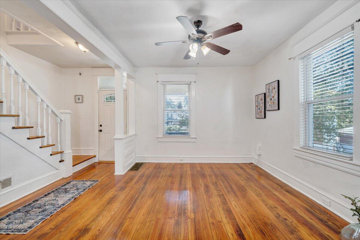 1008 5th Street Southeast Roanoke, VA 24013 - Photo 7 of 60 a view of empty room with wooden floor and fan