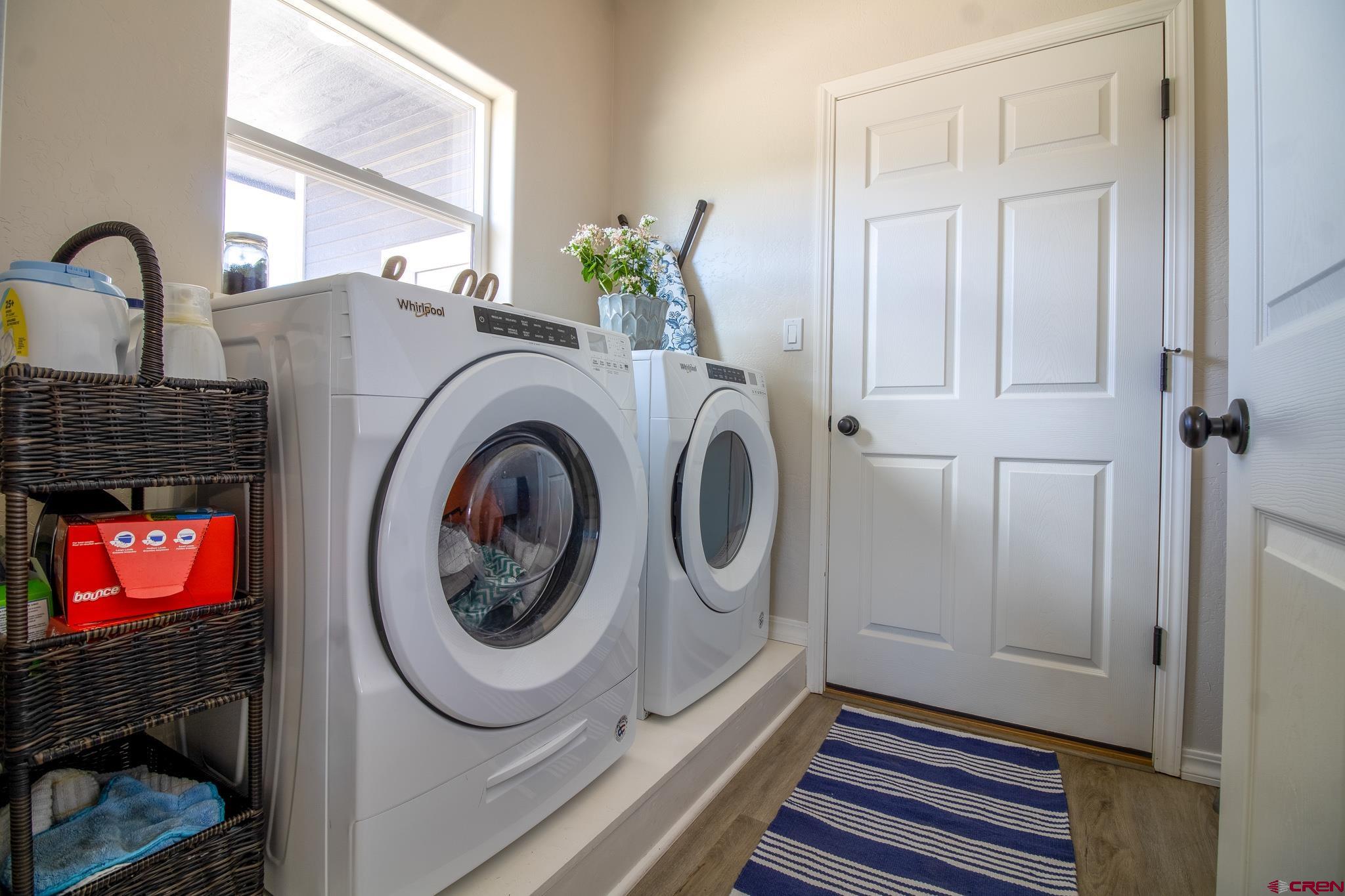 42168 Rd J Mancos, CO 81328 - Photo 21 of 30 a utility room with dryer and washer
