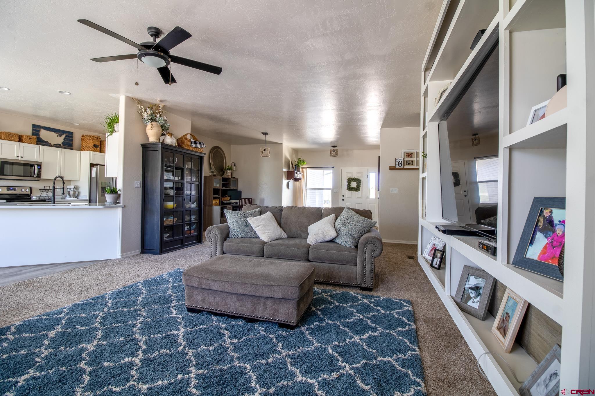 42168 Rd J Mancos, CO 81328 - Photo 6 of 30 a living room with furniture and a flat screen tv