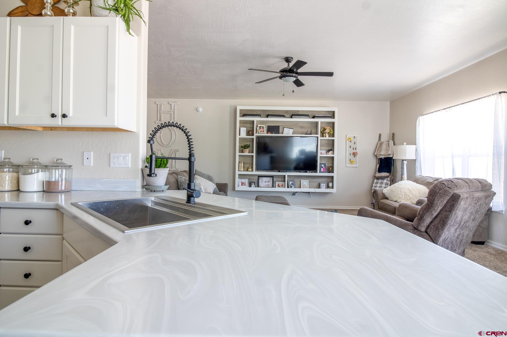 42168 Rd J Mancos, CO 81328 - Photo 7 of 30 a bedroom with a bed and a flat screen tv