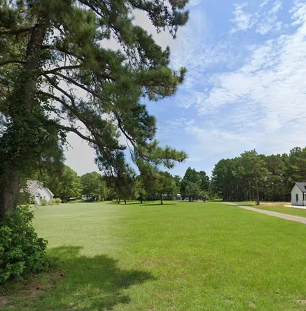 a view of a garden with a fountain