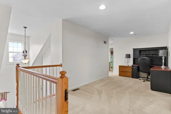 a view of a livingroom with furniture