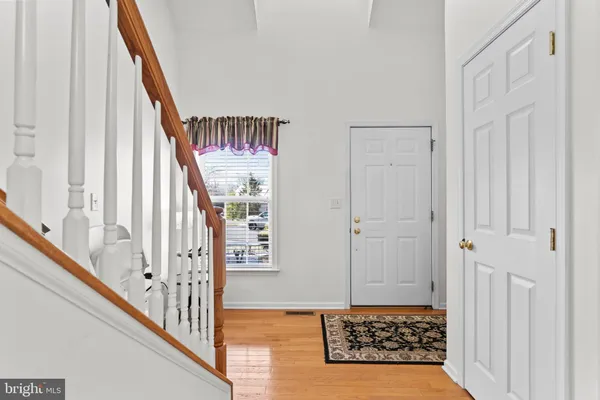 a view of an entryway with staircase