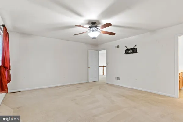 a view of an empty room with window