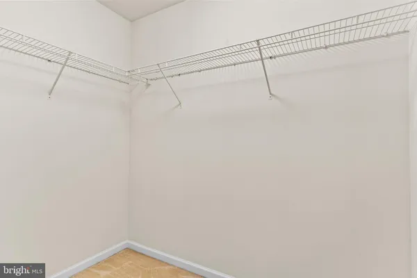 a view of a room with racks on the wall