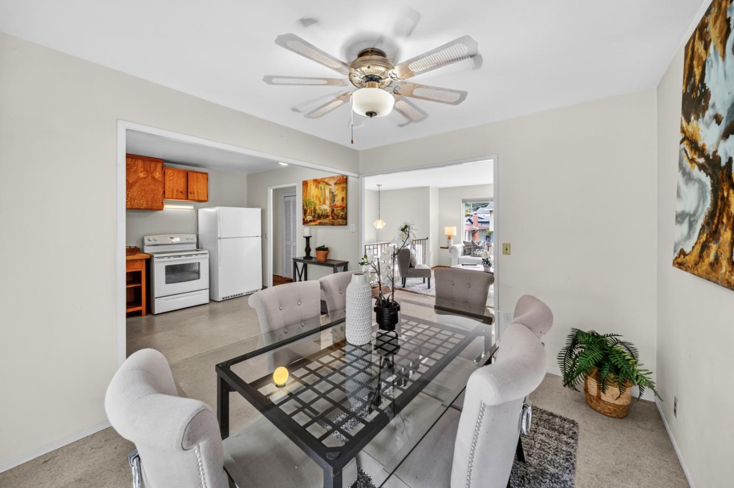 1287 Lerida Way Pacifica, CA 94044 - Photo 29 of 52 a living room with furniture and a chandelier