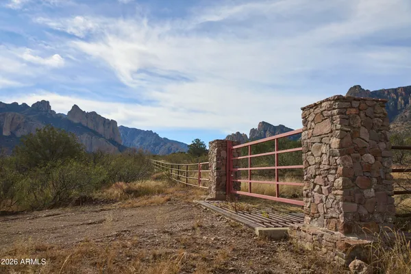 a view of a lake in front of a house