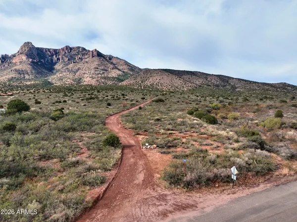 a view of a city with mountains in the background