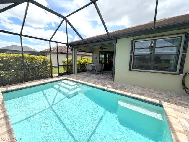 6125 Triumph Lane Ave Maria, FL 34142 - Photo 2 of 45 a swimming pool with outdoor view