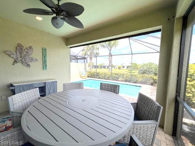 6125 Triumph Lane Ave Maria, FL 34142 - Photo 35 of 45 a bedroom with a bed and wooden floor