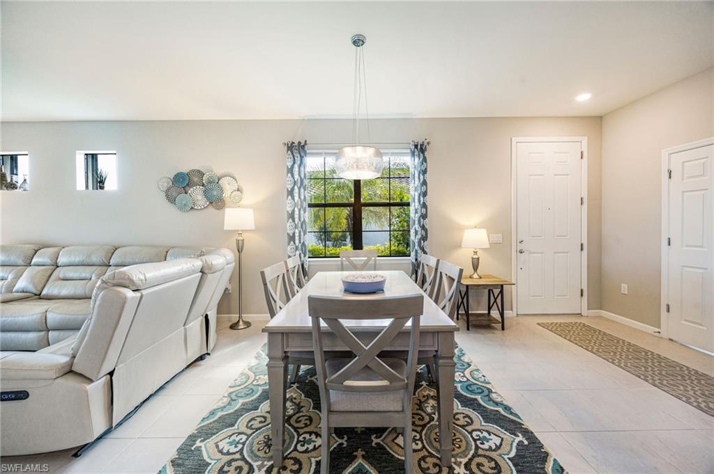 6125 Triumph Lane Ave Maria, FL 34142 - Photo 8 of 31 Dining room featuring recessed lighting and light tile patterned floors