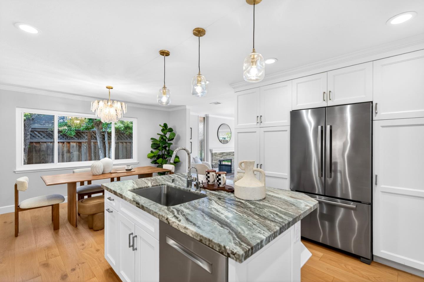 1422 Wright Avenue Sunnyvale, CA 94087 - Photo 13 of 34 a kitchen with stainless steel appliances granite countertop a sink stove and refrigerator