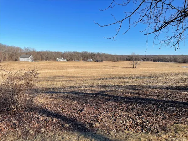 a view of swimming pool with an outdoor space and seating