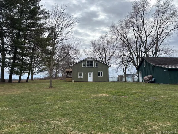 a front view of house with yard