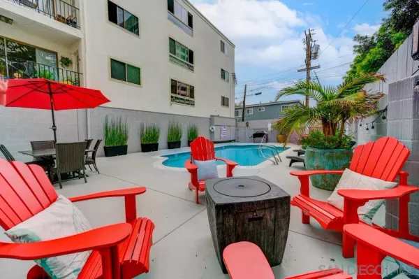 an outdoor space with patio furniture