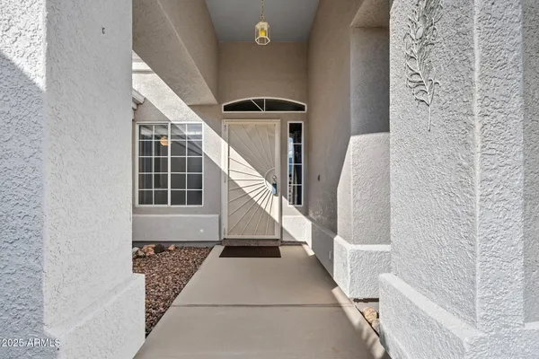 a view of entryway with a front door