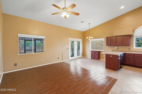 a view of a kitchen with a sink and a window