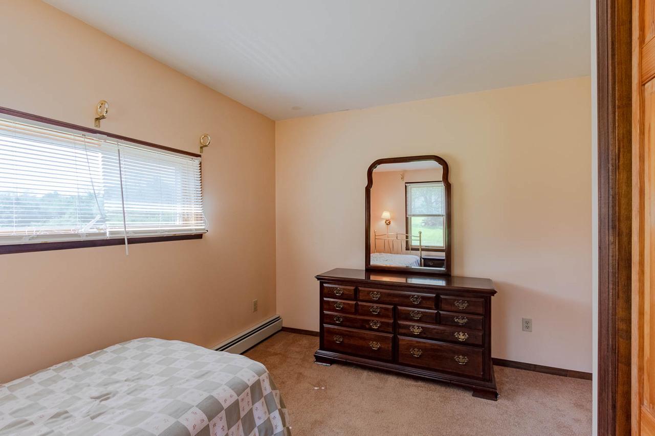 203 Gorton Road Moshannon, PA 16859 - Photo 14 of 39 a bedroom with a bed and a window