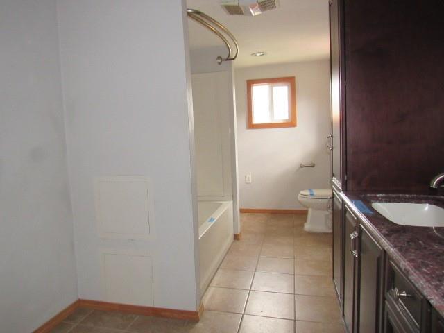 240 Main Street Dickerson Run, PA 15430 - Photo 14 of 20 a bathroom with a sink a toilet and mirror
