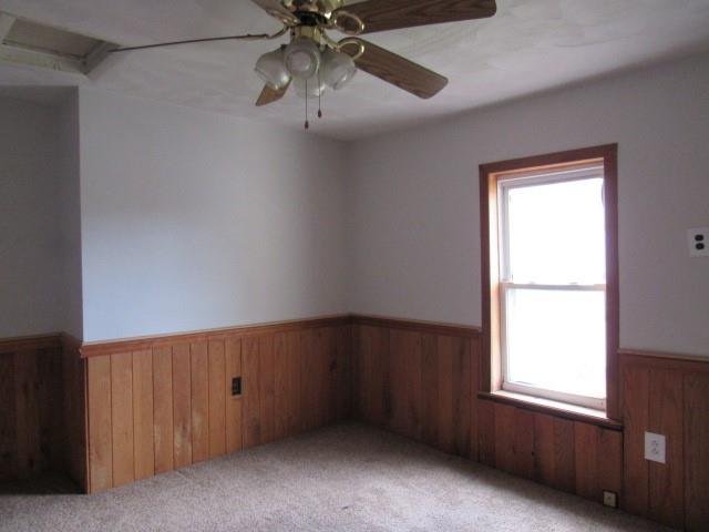 240 Main Street Dickerson Run, PA 15430 - Photo 16 of 20 an empty room with a window and a fan