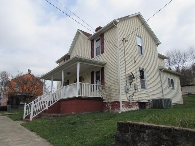 240 Main Street Dickerson Run, PA 15430 - Photo 2 of 20 a view of a house with a yard