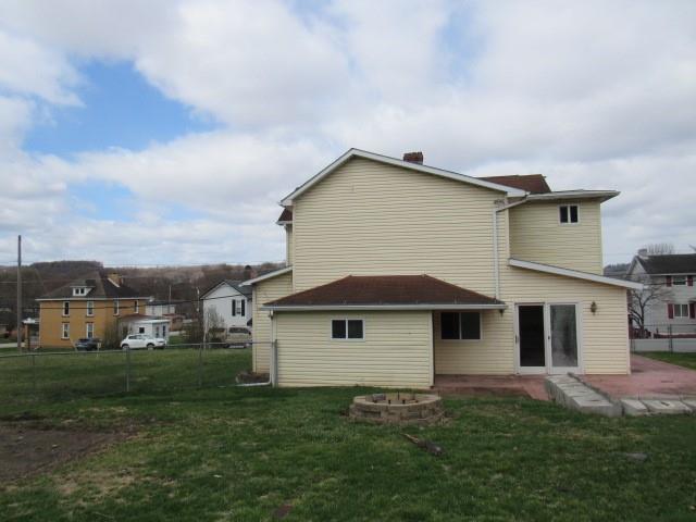 240 Main Street Dickerson Run, PA 15430 - Photo 5 of 20 a front view of a house with a yard