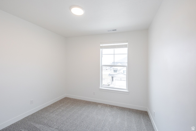 693 West 4500th South, Unit O301 Mapleton, UT 84664 - Photo 5 of 16 Empty room with light colored carpet and baseboards
