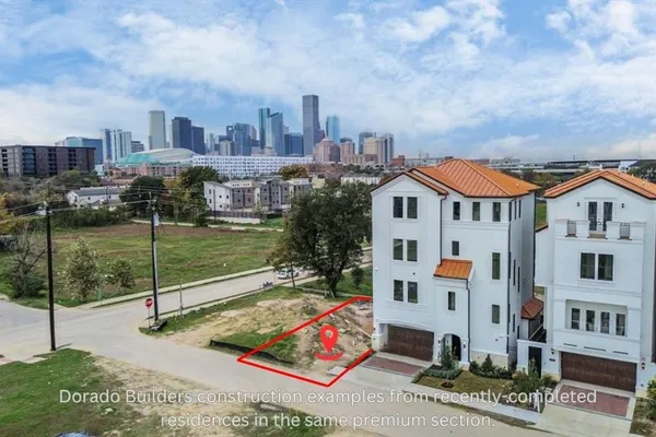a view of a city with tall buildings