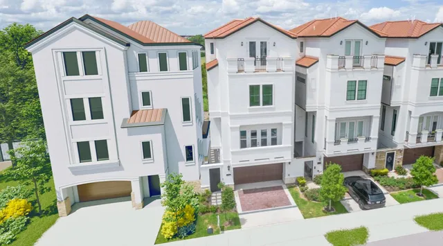 an aerial view of a house with outdoor space