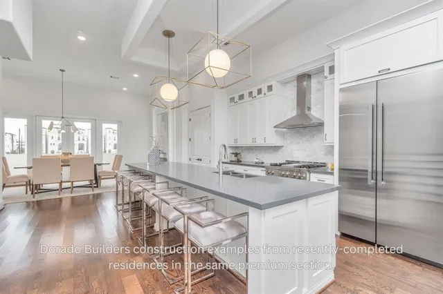 a spacious bathroom with a granite countertop sink a toilet a mirror and shower