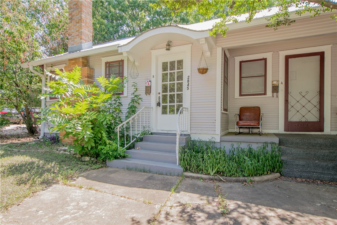 2845 San Gabriel Street, Unit B Austin, TX 78705 - Photo 1 of 1 a front view of a house with a yard