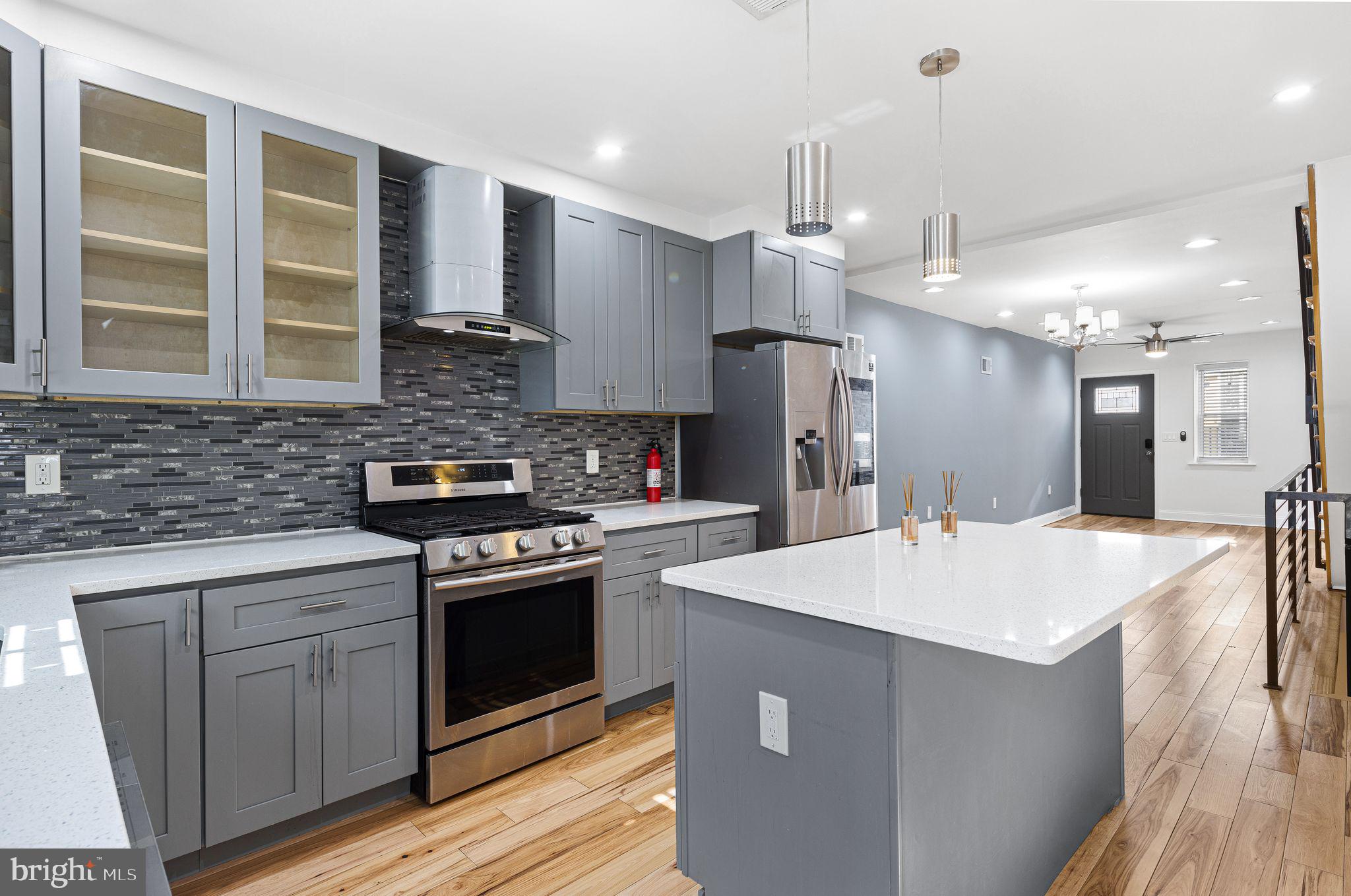 640 Emily Street Philadelphia, PA 19148 - Photo 5 of 15 a kitchen with a sink a stove and refrigerator