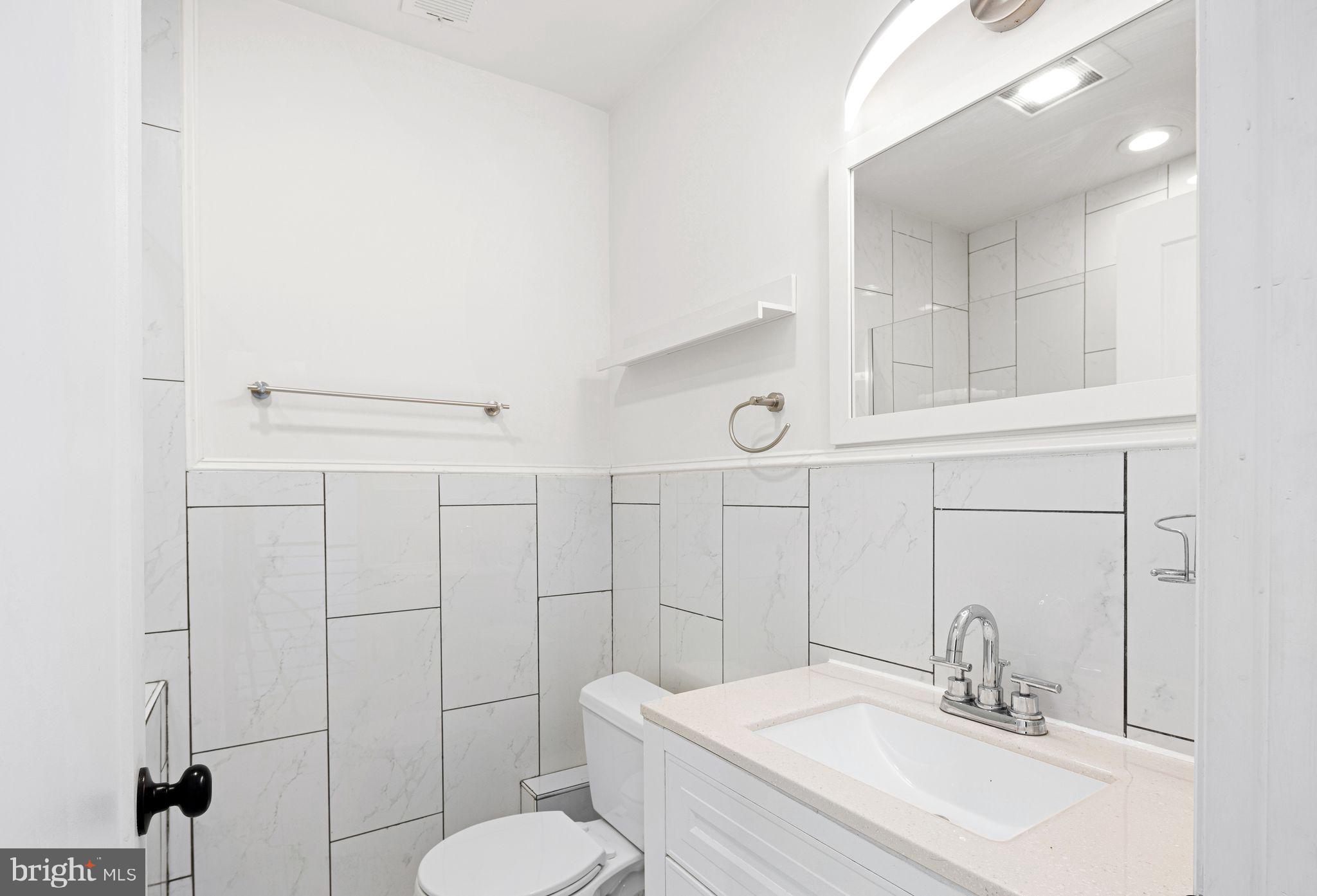 640 Emily Street Philadelphia, PA 19148 - Photo 7 of 15 a bathroom with a sink toilet and shower