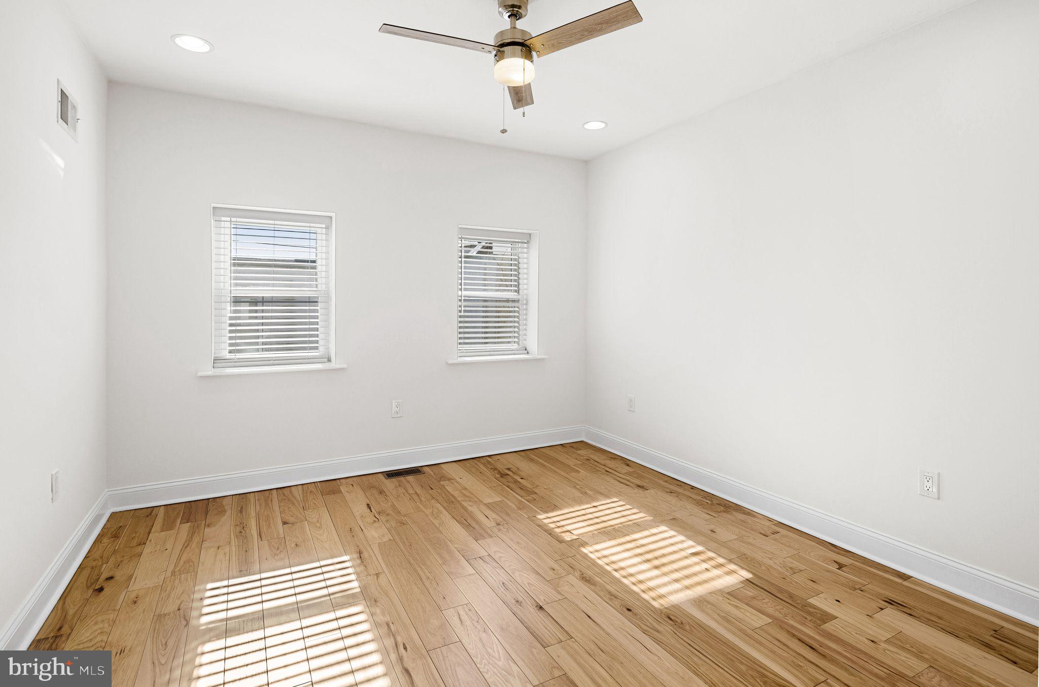 640 Emily Street Philadelphia, PA 19148 - Photo 8 of 15 a view of empty room with wooden floor and fan